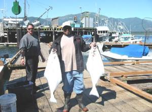 Another happy D&D Fishing Charters customer with his bounty of halibut